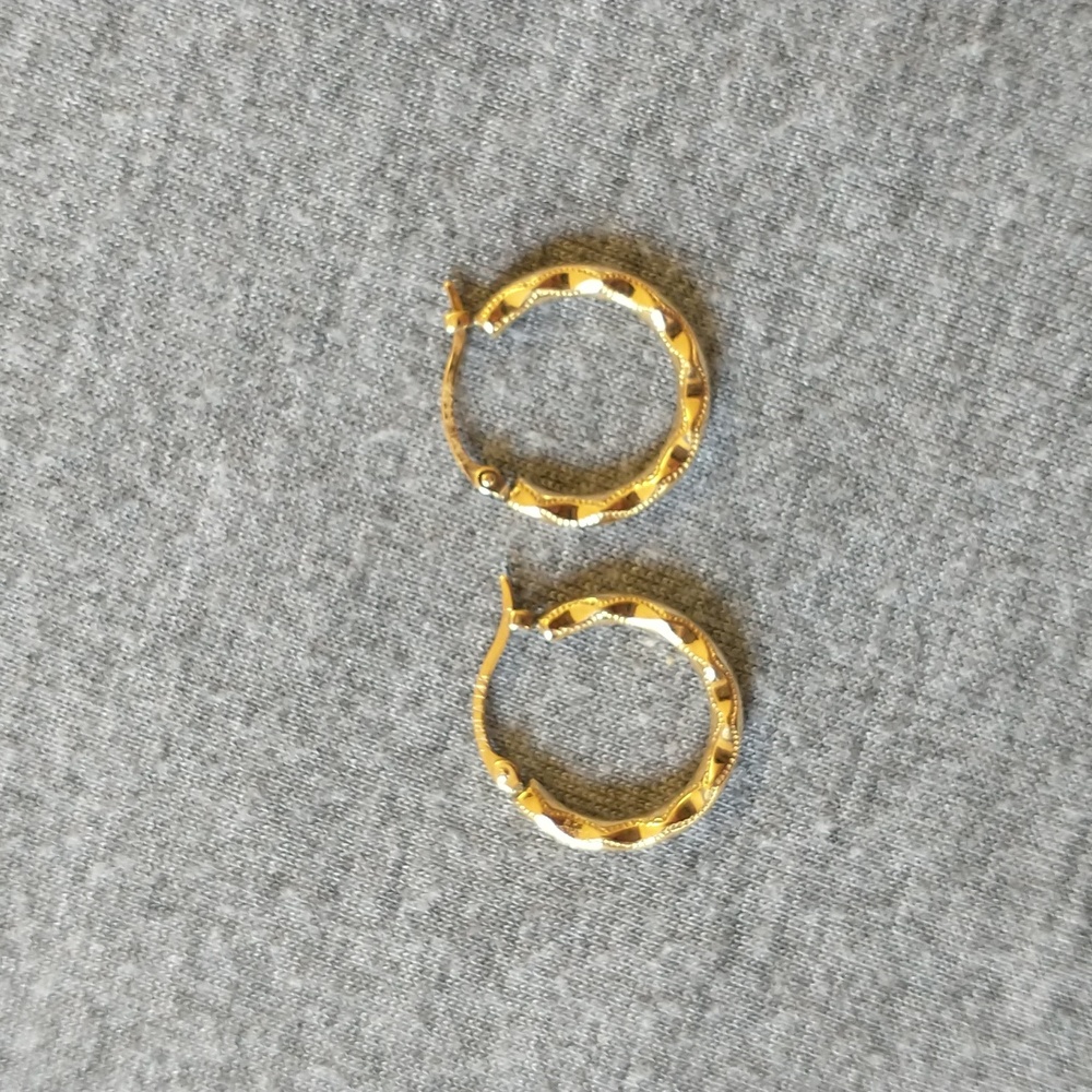 14k solid gold hoop earrings.